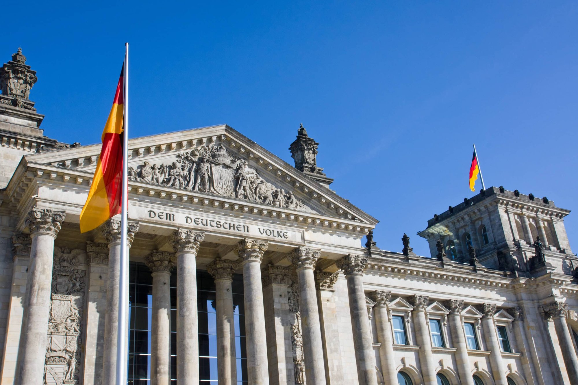 reichstag-with-german-flag-2023-11-27-05-10-13-utc-scaled